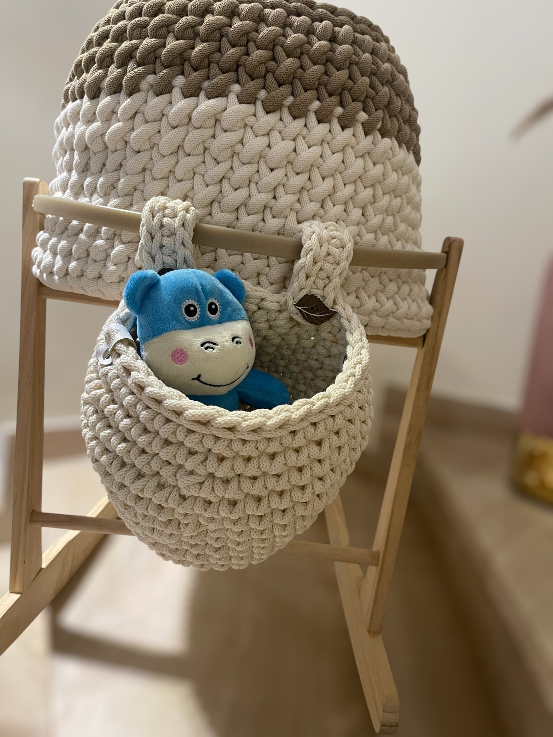 Hanging basket from cradle
