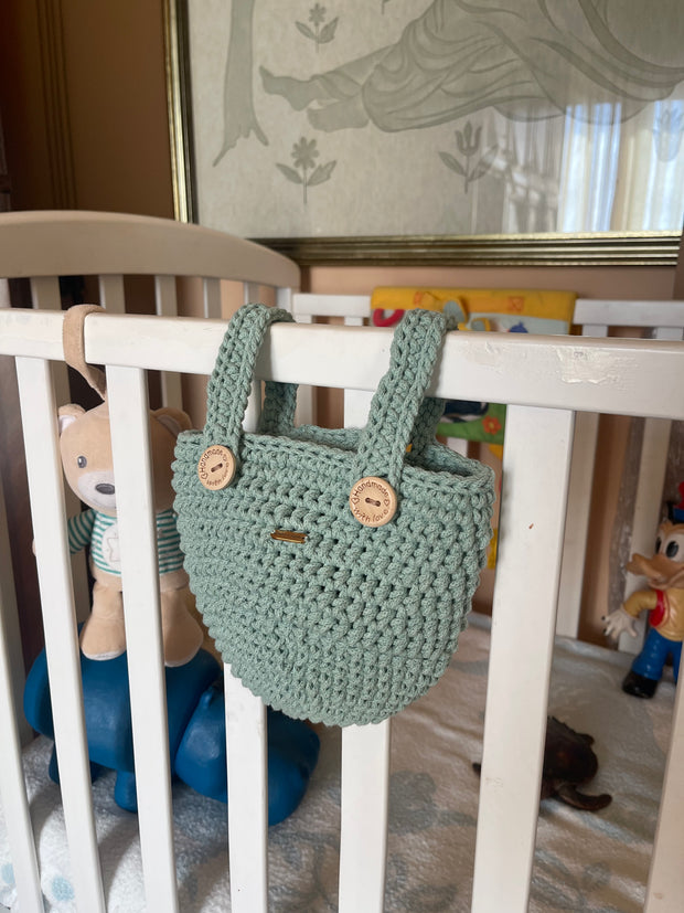 Hanging basket from cradle